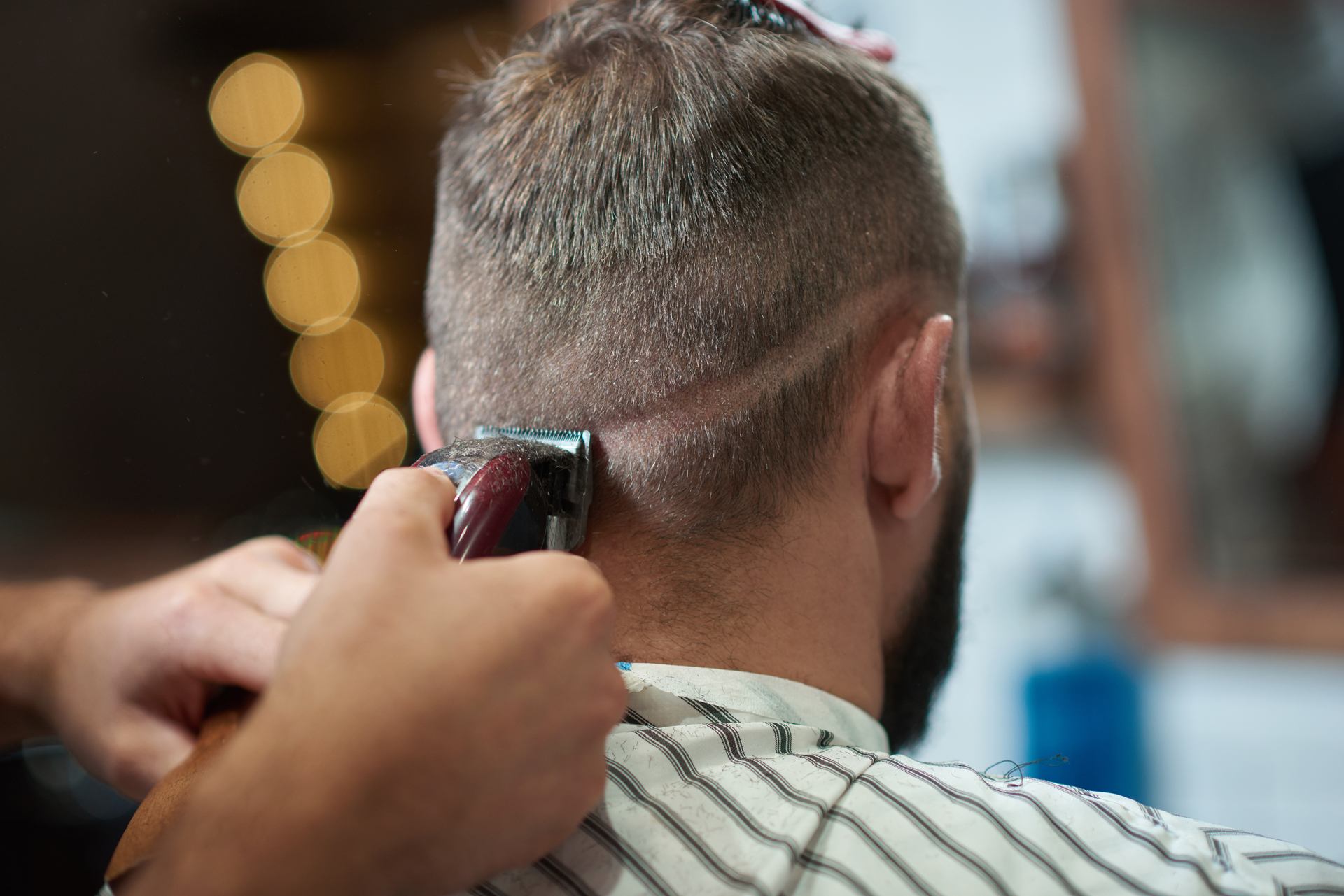 young-man-at-the-barbershop-R8325N8.jpg